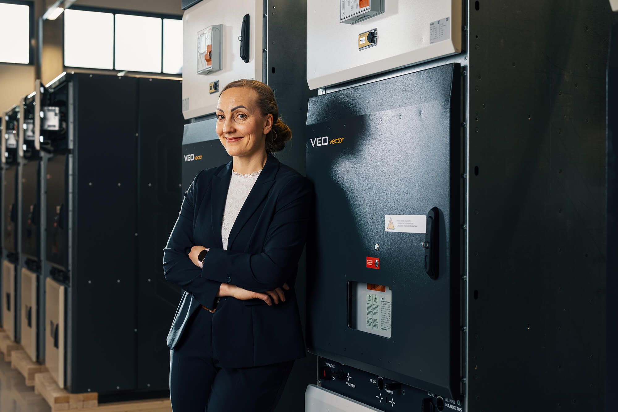 VEO's CFO Outi Mäntylä photographed in VEO's FAT hall